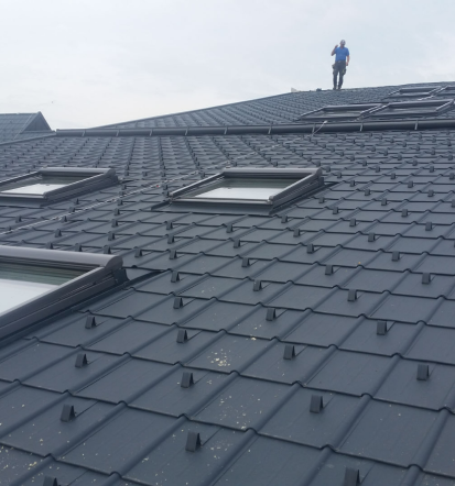 Nadstreški, montaža Velux oken