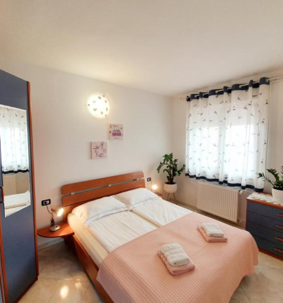 Lep apartma v Sečovljah - primer spalnice